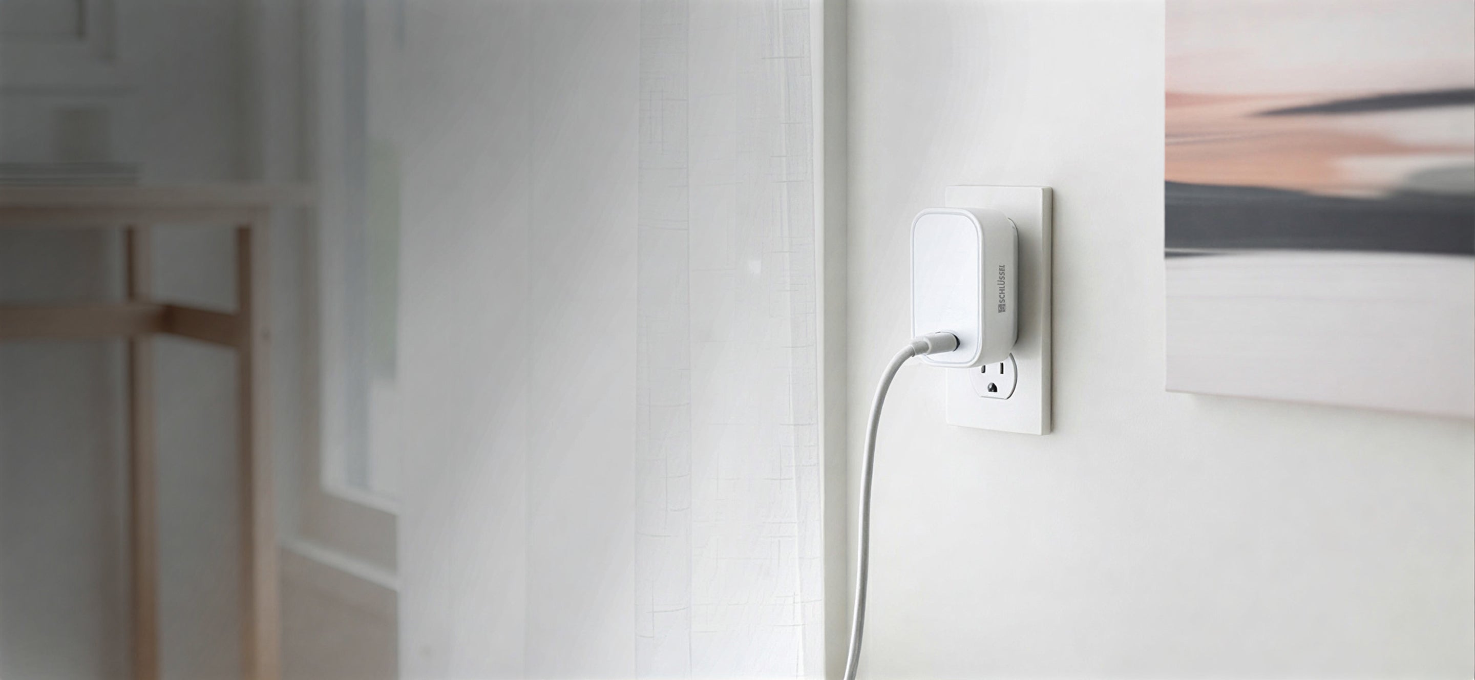 Schlüssel wall charger in a bright minimalist interior with soft natural light